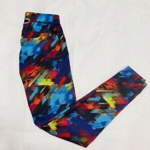 Athleta Multi colored leggings size S.    A225
